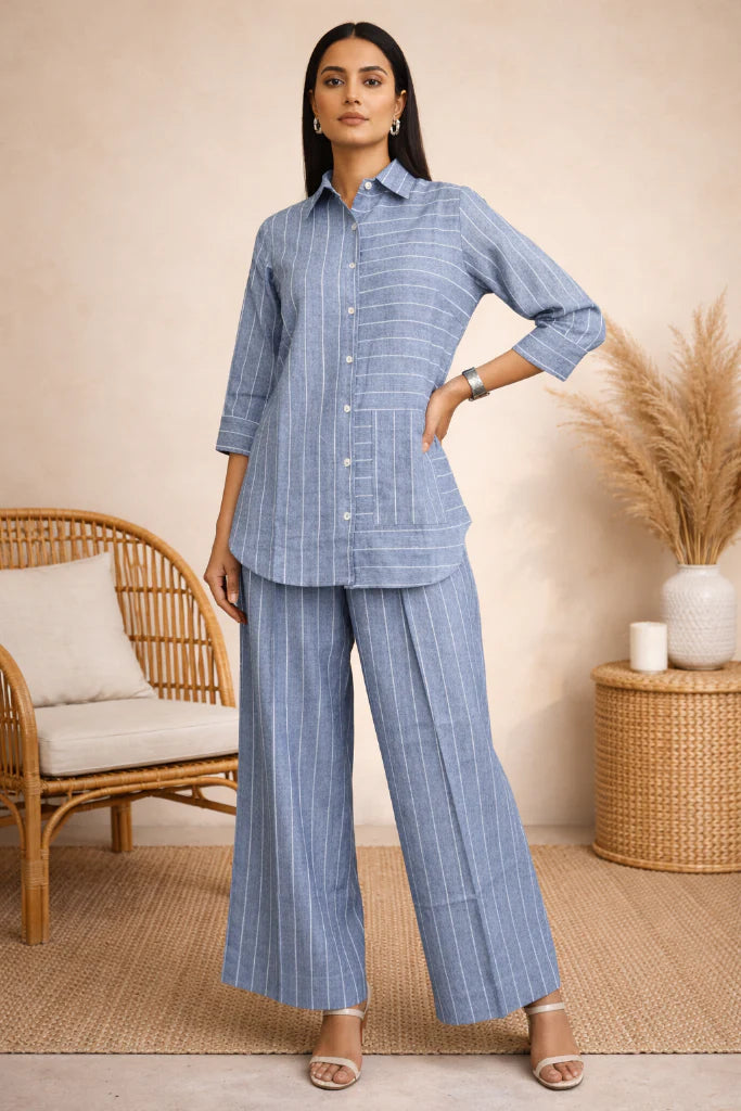 Striped Linen Co-ord Set featuring a horizontal and vertical stripe play. Comes with a button-down shirt and functional pocket detailing.